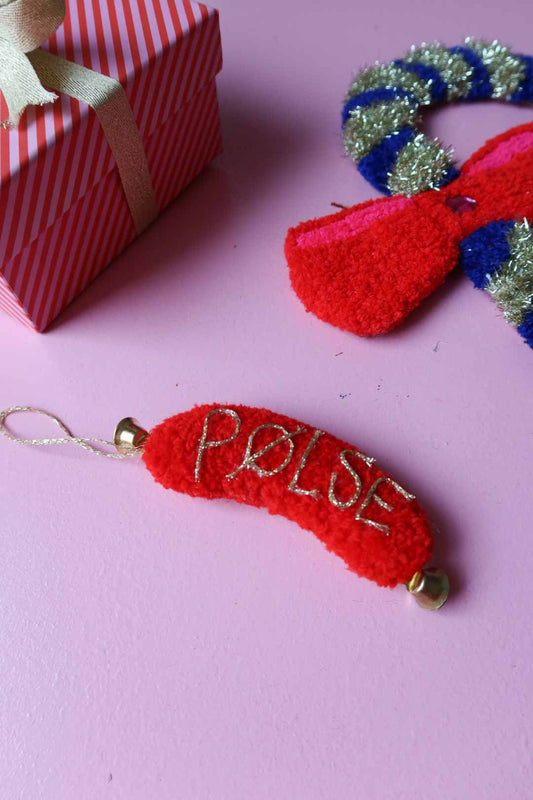 Pels Pølse (sausage ornament)